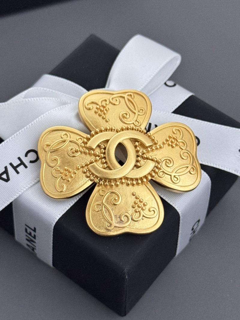 Ch**el brooches